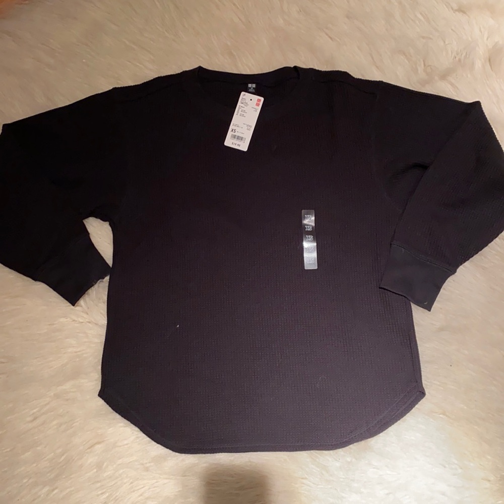 Uniqlo sweatshirt. New with tags. XS (oversized) fits Medium. Black.